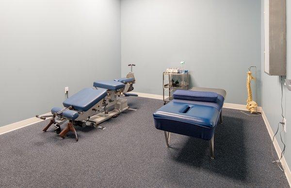 Treatment room with diversified and Cox adjusting tables