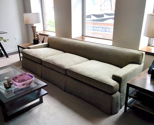 Sofa reupholstered in a textured fabric with brand new seat cushions made out of foam & down.