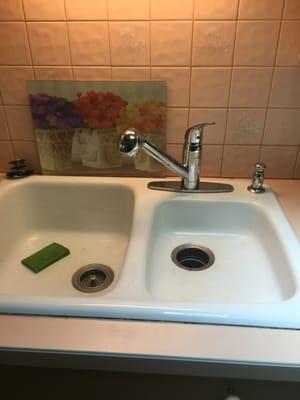 New pullout spray faucet with soap dispenser.