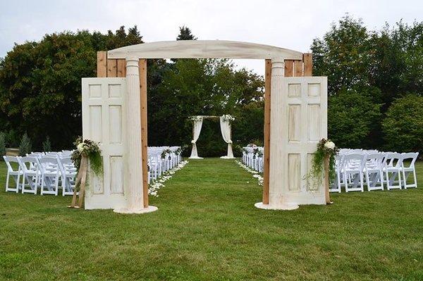 Wedding Ceremony with a door entryway.