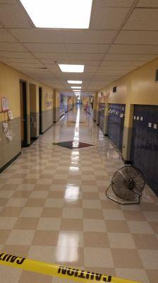 Wall washing and floor cleaning the school