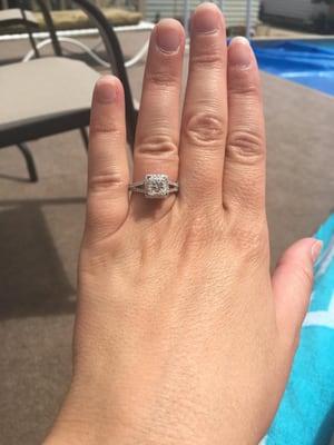 She said yes!!! The diamond is impeccable.