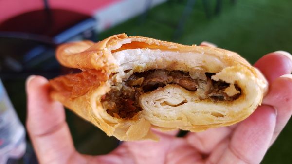 Interior of lentil sambusa ($1.50). Unusual thick shell. Dry lentil filling. Decent on a whole.