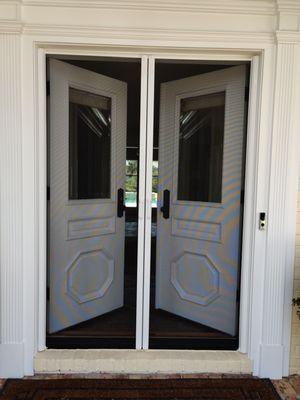 Double retractable screen door