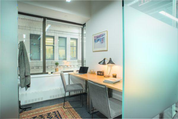 One of the many private offices available for rent at Bond Collective's location at 55 Broadway.