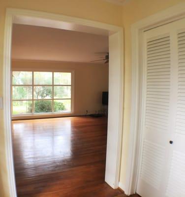 Entry way with view of the large main living area. Original hard wood flooring, great windows for a cascade of light yet priv...