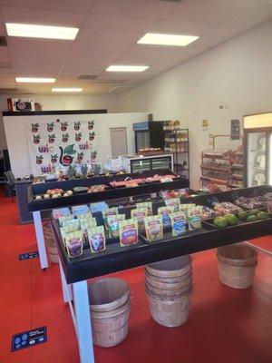 Inside WIC store looking all clean and organized, with lots of fresh fruit and vegi's