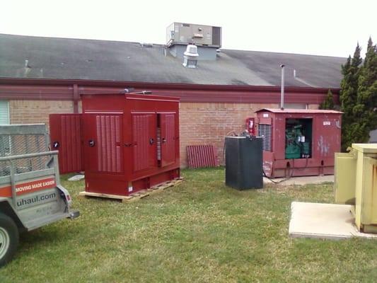 Generator on right inside an old corroded housing, to be installed the new aluminum housing on the left.