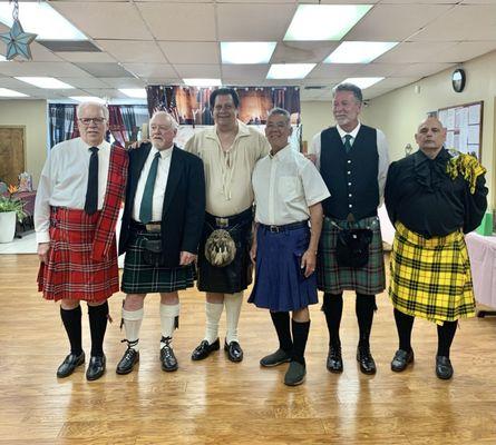 The men in kilts, who graciously served us.  They were funny and welcoming!