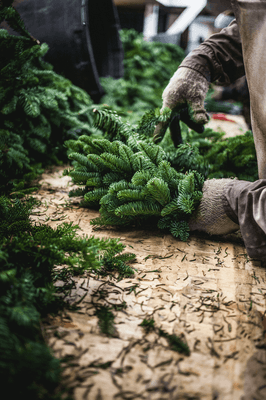 Our team hand making the wreaths