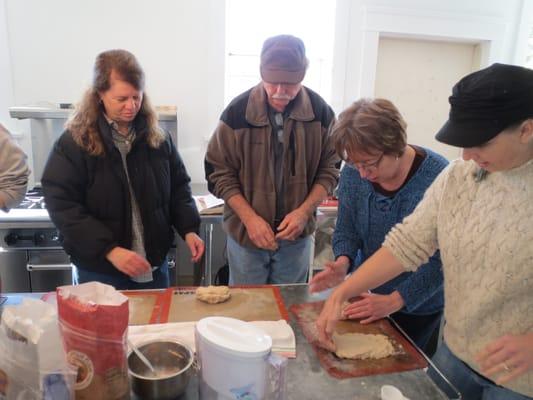 Learning to bake bread together.