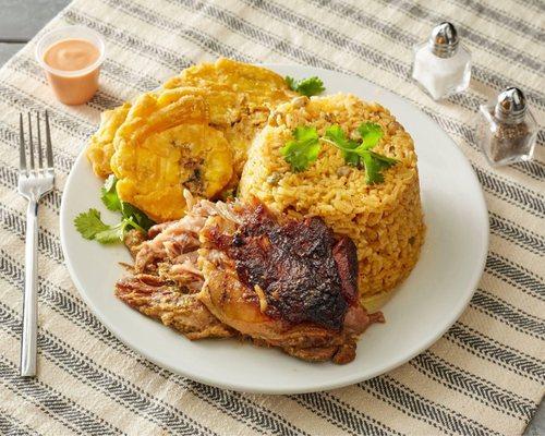 Roast Pork with yellow rice & peas with fried plantains  Pernil asado con arroz con gandules y Tostones