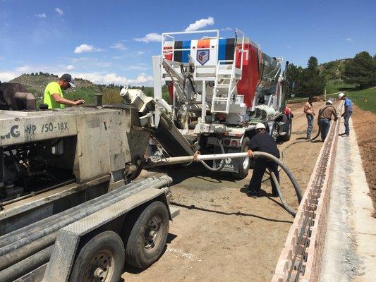 Laying a grout mix for a wall.