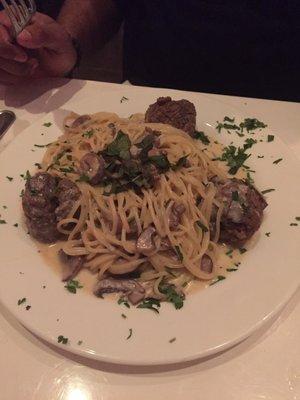 Pasta with meatballs in mushroom sauce