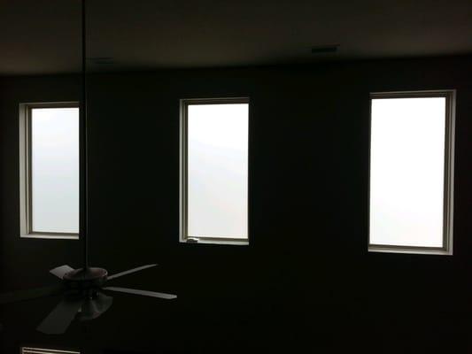 Frosted window film installed. The day was overcast and hazy, but you get the idea.