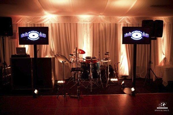 DJ with Live Entertainment along with(2) 50" monitors and percussionist and uplights