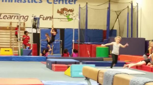 Balance beam, trampoline, and climbing rope.