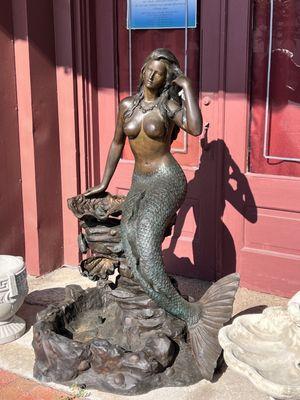 Bronze mermaid fountain