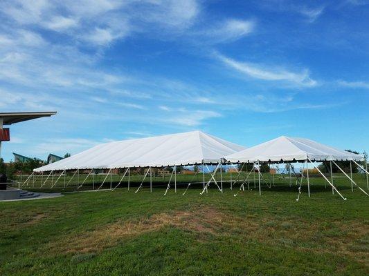 40' x 100' next to 20' x 30'. ZERO center poles with our Frame only tents and notice the 14.5' high roof or the 12' high roof profile change