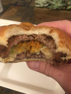 This "bad boy" LOOKS just as flat as it tastes... Did someone accidentally sit on my burger?