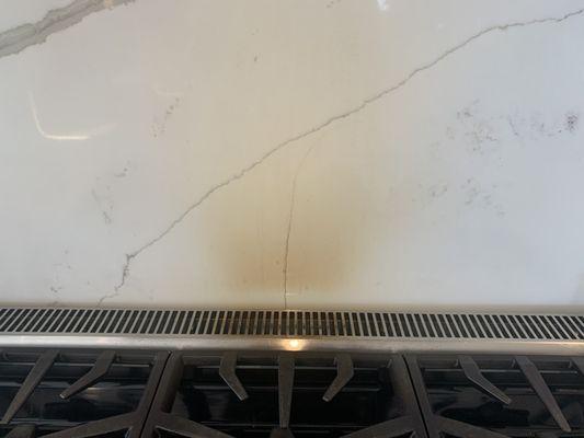 Here is my quartz back splash that they installed. It burns!!