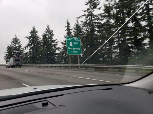 Rockworks truck dumping gravel on I5