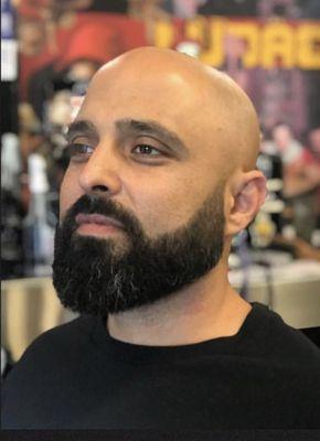 Detailed beard trim and line-up