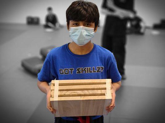 Age-specific martial arts themed child development classes