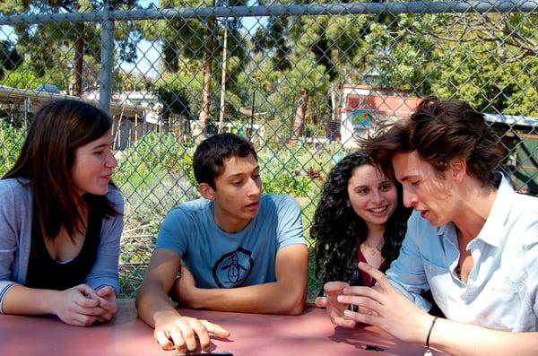 Secondary students take a break in Los Feliz's community garden.