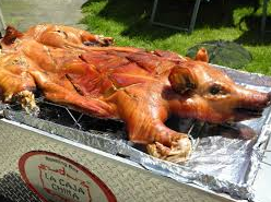 Whole Roasted Pig, done with La Caja China www.elcubanocatering.com