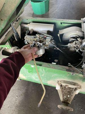 A carburetor that came off of a John Deere 6x4 gator