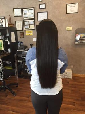 Same client after having the Keratin Smoothing System done. Are you tired of flat ironing your hair everyday? If you are give us a call.