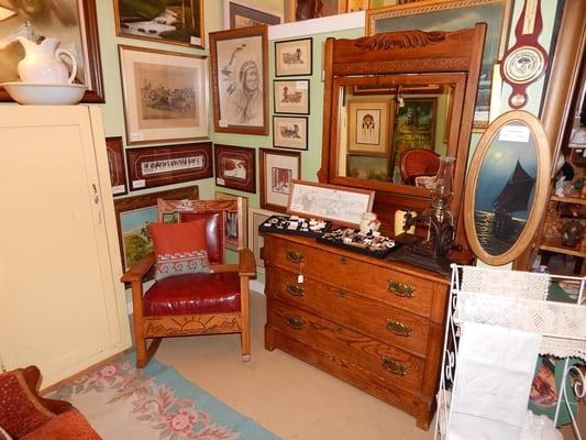 Great oak 1950's Native-American-designed rocking chair, and antique three-drawer oak dresser with mirror