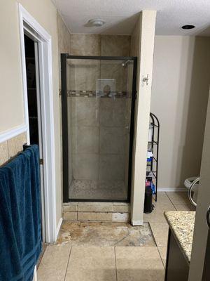 A dilapidated  36"x36" shower that was leaking and moldy. Owner could not use and wanted to upgrade to a 4'x8' shower.