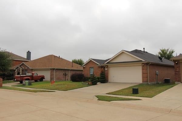 Two roofs we did side by side.  One is more black and the other is resawn shake both Certainteed roofs.