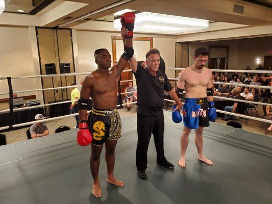 Malik winning a recent Muay Thai bout