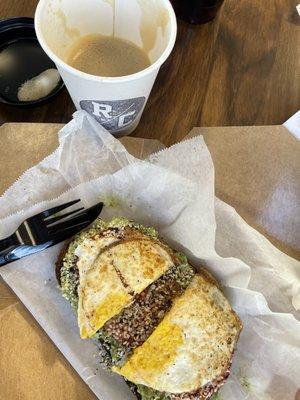 Mocha oat latte and avocado toast with fried egg