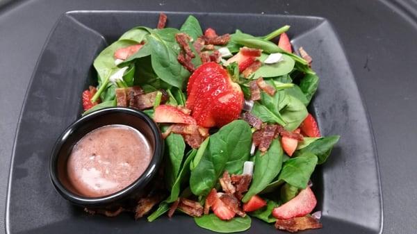 Spinach salad with raspberry vinaigrette dressing