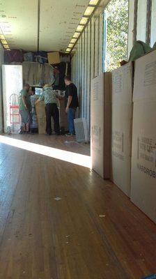 Just me and some of the workers unloading a tractor trailer