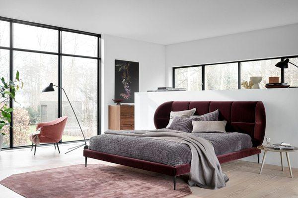 Oxford bed in  Dusty red Velvet fabric 3133, Charlotte armchair in Dusty purple Lux Felt fabric 2308 by BoConcept