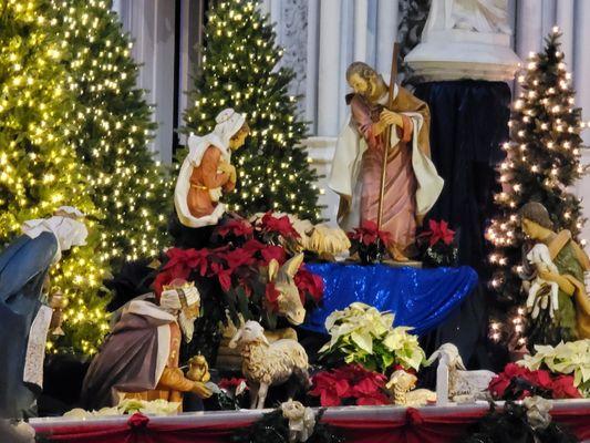 Nativity on the alter before Christmas Mass