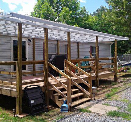 After adding a new porch, painted only the top boards to match the house.