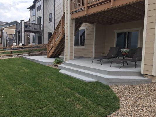 New concrete patio, rock, sprinkler system and sod, installed for a client in Leyden Rock.