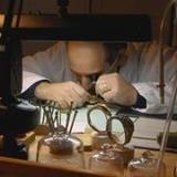 Watchmaker, David Perlowin, at his bench in Santa Fe.