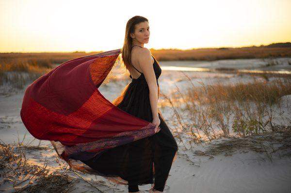 I adored how the wind carried her scarf, and how it accents the colors of sunset.