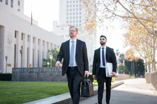 Point Law Group attorneys outside of a courthouse