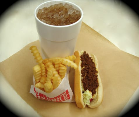 Collie dog with small fries and a medium drink