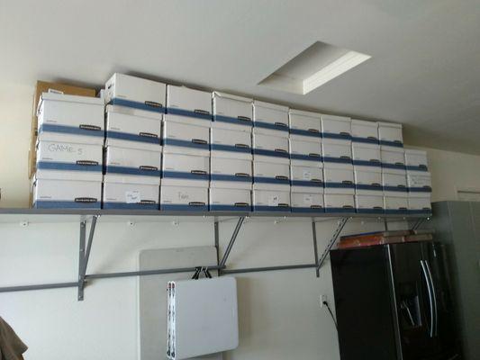 Boxes of old tax documents... super heavy, but our Monkey Bars Garage Shelves don't even break a sweat! Fully adjustable, off the floor!