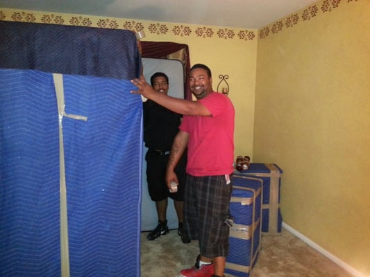 Edwin's team from American Movers wrapping my bed