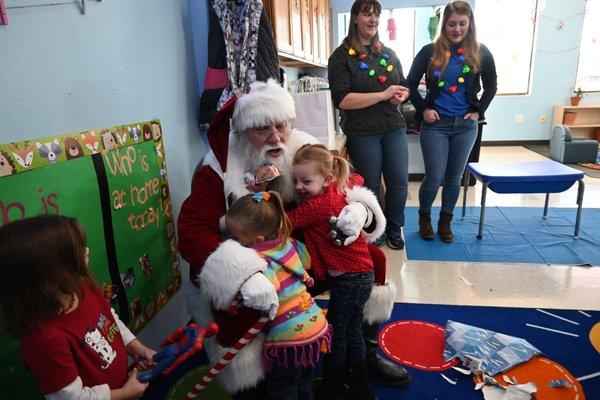 Santa visits preschool every December.